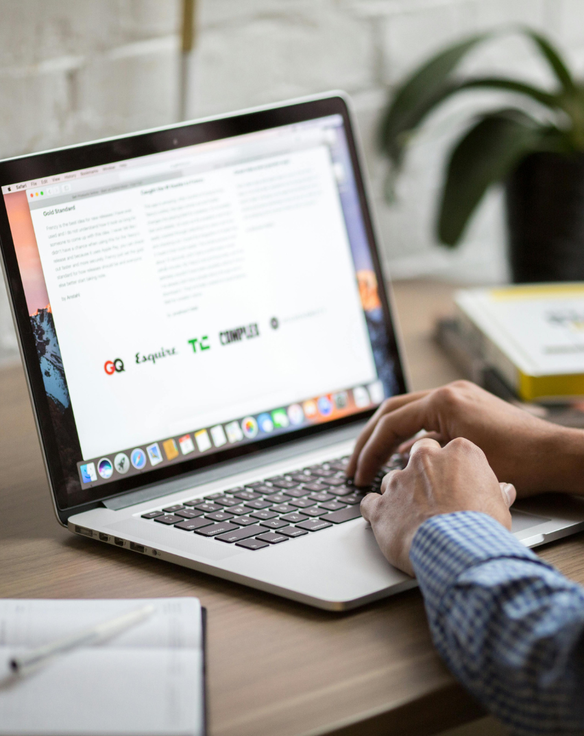 Person typing on a laptop